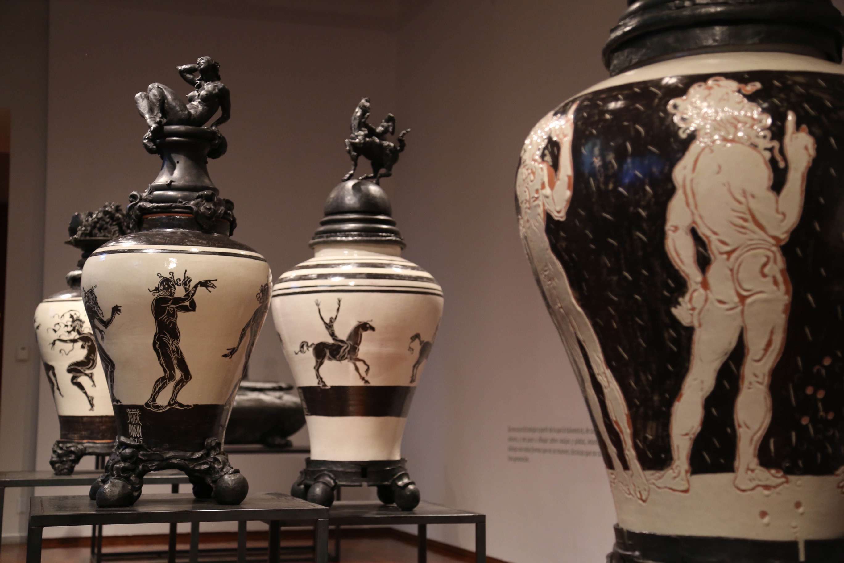 A series of ceramic vases by Javier Marin suggest a time of ancient Rome.